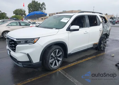 2025 Honda Pilot Touring z USA, uszkodzony, nr VIN 5FNYG1H71SB153061